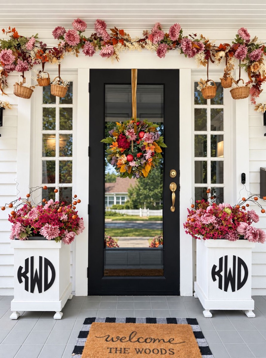 Purple and Pink and Orange Front Porch Decorated With Pumpkins